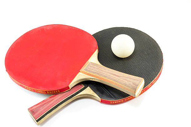 istock Two table tennis rackets and a ball isolated 474785126
