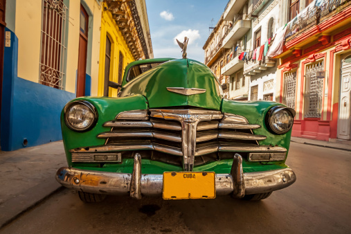 Antique colourful car on the streets of Central Havana Cuba