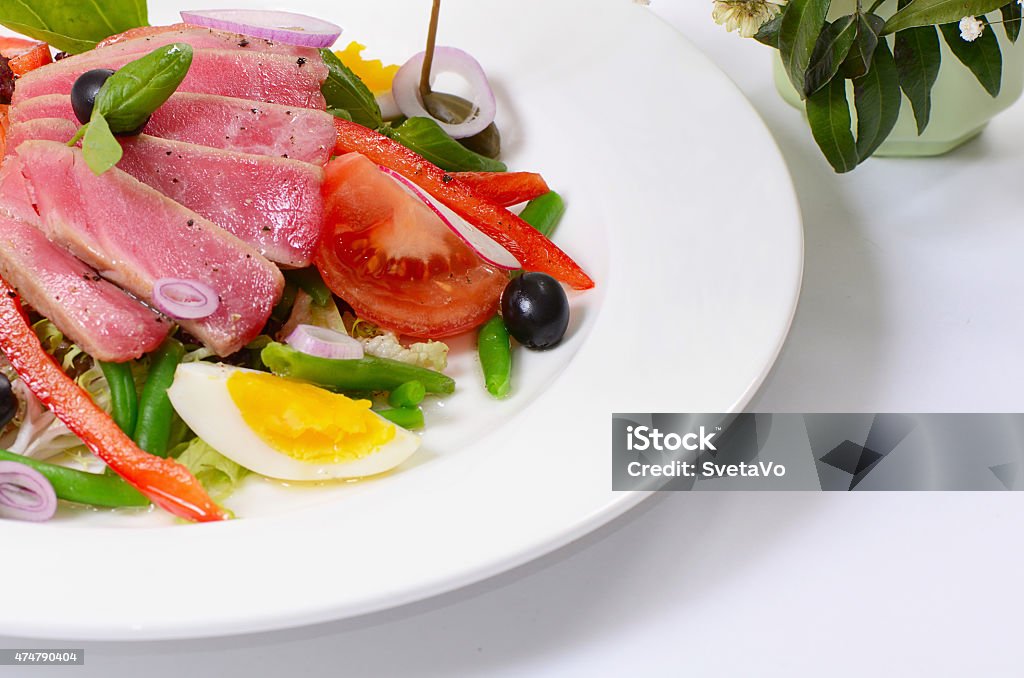 Nicoise with fresh tuna and vegetables 2015 Stock Photo