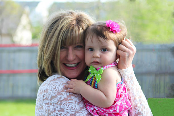 istock Grandmother and Granddaughter Pose For Camera 474790458