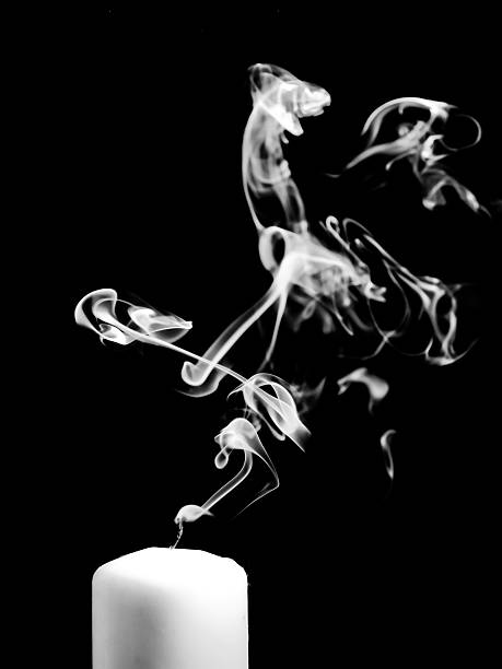istock Smoke coming from a blown out candle 474791790