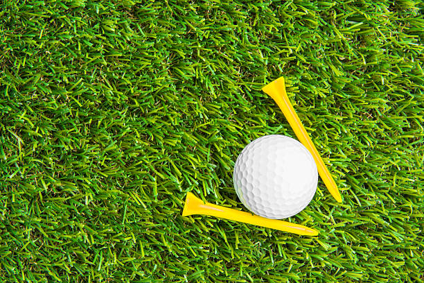 istock Close up of golf ball and tee 474793773