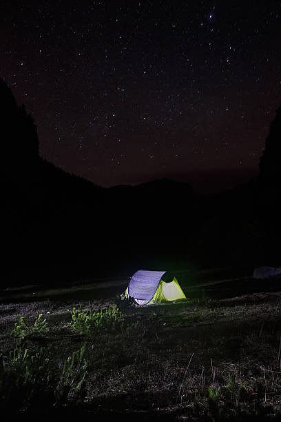 istock Night landscape with tent pitched on a mountain pasture 474808016