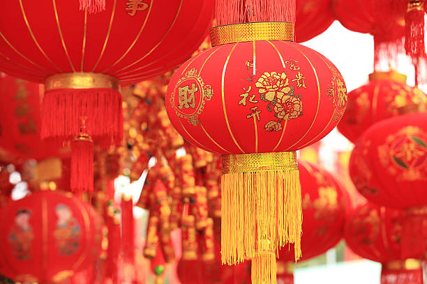 istock chinese red lantern and fake firecrackers 474808380