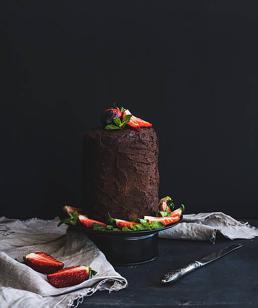 istock Chocolate high cake with strawberry, dark background 474808484