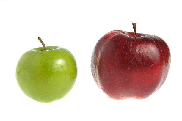 Two red and green apples isolated on white