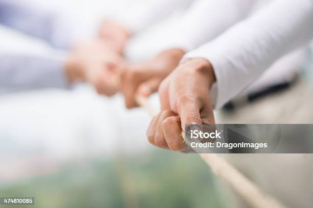 Team Support Stock Photo - Download Image Now - Rope, Pulling, Tug-of-war