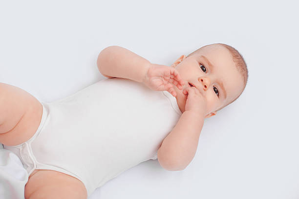 istock Little child baby in bed 474811570
