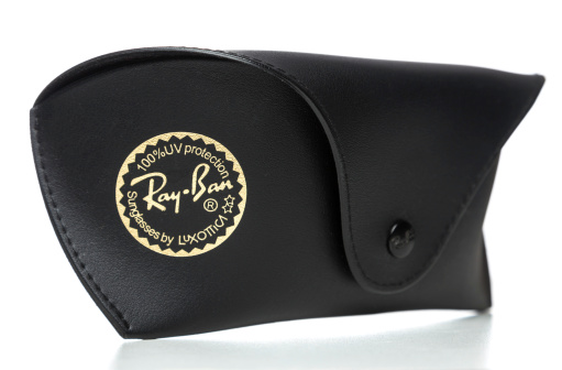 Miami, USA - February 13, 2014: Ray-Ban  sunglasses case. ray-ban brand is owned by LUXOTTICA GROUP S.P.A.