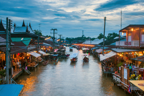 Samut Songkhram, Thailand - September 14, 2013: Ampahwa floating market. Amphawa is one of the most famous floating markets in the world.