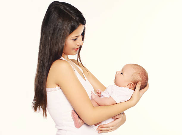 istock Mother holding on hands her infant 474837860