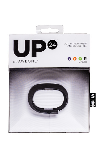 New York City, New York, USA - February 19, 2015: Photograph of a UP24 Jawbone wireless fitness tracker wristband in package on against white background.  Jawbone is a privately held consumer technology and wearable products company headquartered in San Francisco, California.