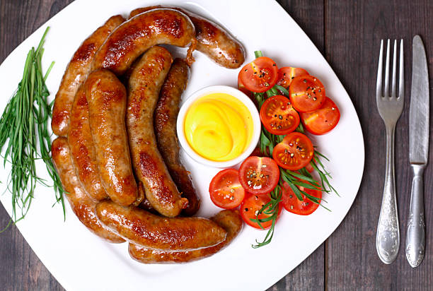 istock German sausages with tomato and beer 474838208