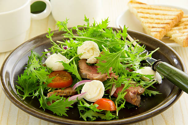istock Roast beef salad with tomatoes and mozzarella. 474838643