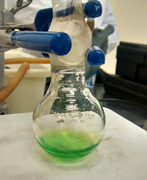 istock Green flask in the laboratory 474841912