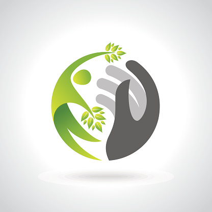 Human hands protecting green leaves, save earth concept.