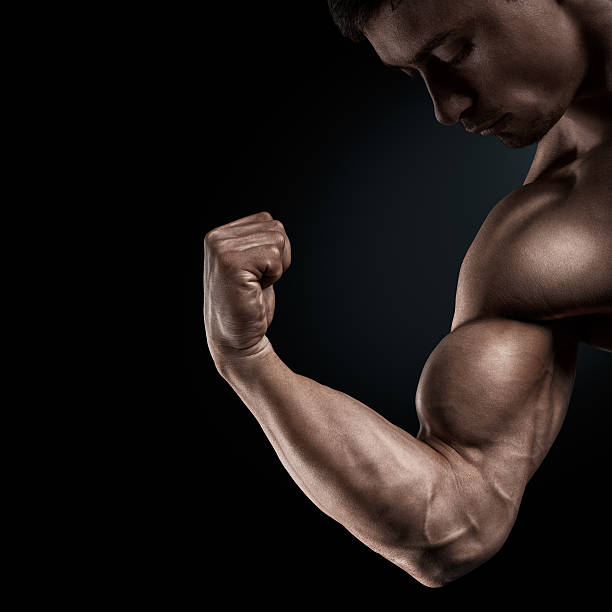 istock Close-up of athletic muscular hand 474844134