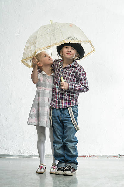 istock Children under the umbrella 474846794