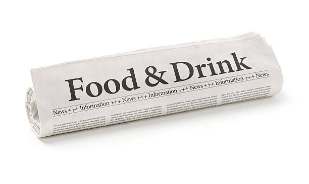 istock Rolled newspaper with the headline Food and Drink 474849272