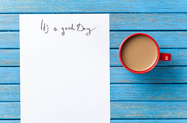 istock coffee and paper with Good day inscription 474849424