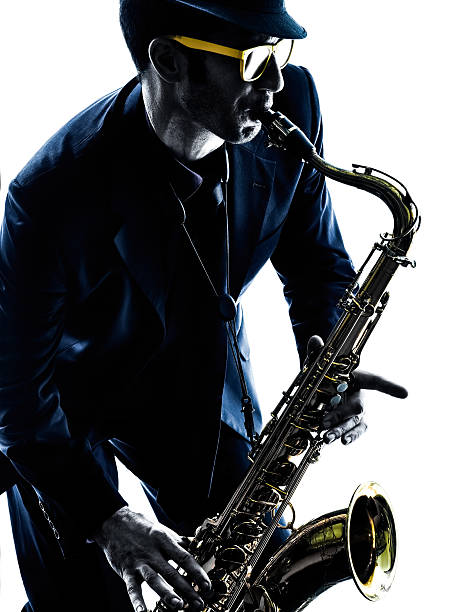 istock man saxophonist playing saxophone player  silhouette 474849684