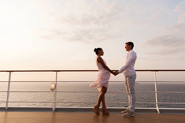 istock lovely couple holding hands on a cruise 474852556