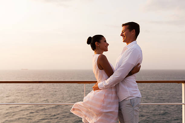 istock romantic couple embracing on a cruise ship 474852558