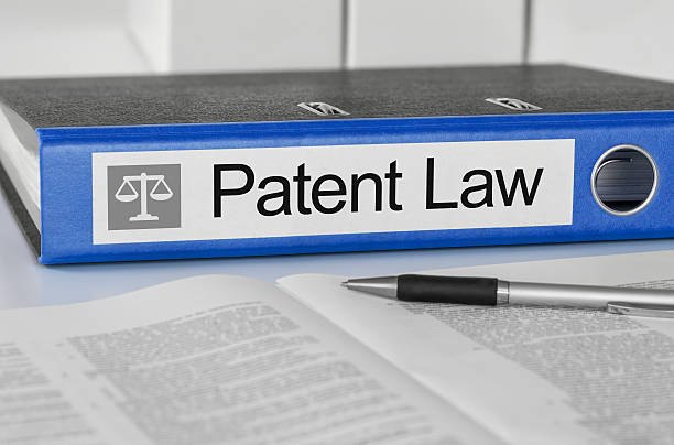 istock Blue folder with the label Patent Law 474852856