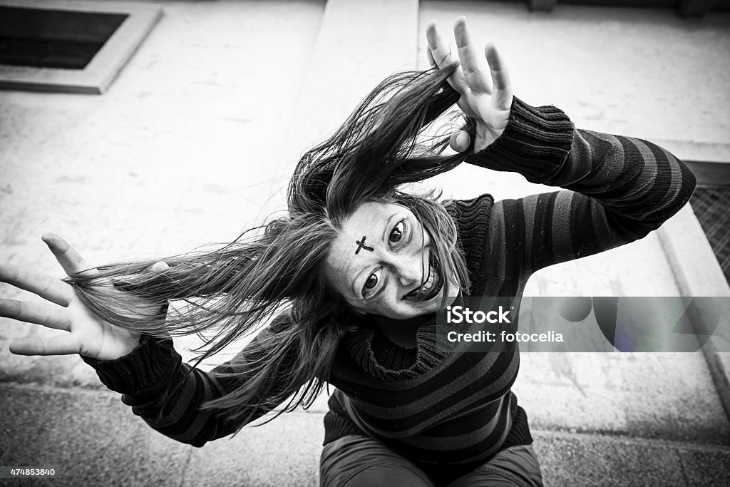 Vampire bad girl Girl with satanic and gothic cross, halloween 2015 Stock Photo