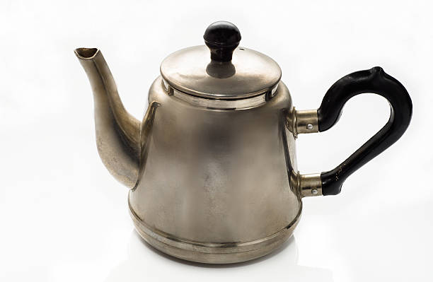 istock Vintage, old teapot from the samovar on a white background 474853870