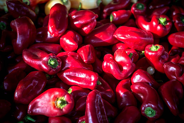 レッドの甘唐辛子 market スタンド - pepper bell pepper market spice ストックフォトと画像