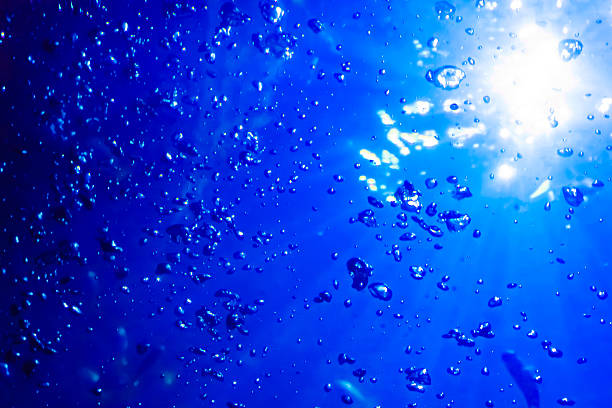 istock Water and air bubbles.  blue underwater 474857794