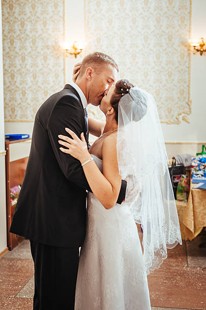 istock beautiful caucasian couple just married and dancing their first dance 474858262