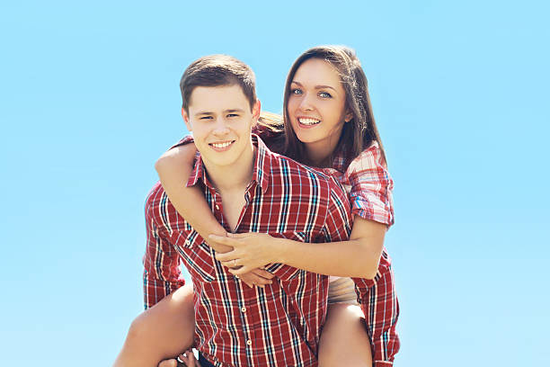 istock Summer happy young hipster couple having fun outdoors against th 474858544