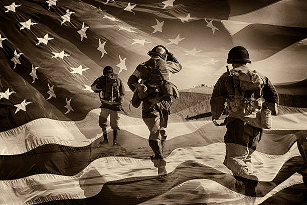 American Heroes - WWII Combat Soldiers Composite Three Active Duty American Soldiers Running Through a horizontal image of a field of stars and stripes.  Battle ready and running.  Sepia Toned.  Grain.  Composite Image. battle photos stock pictures, royalty-free photos & images