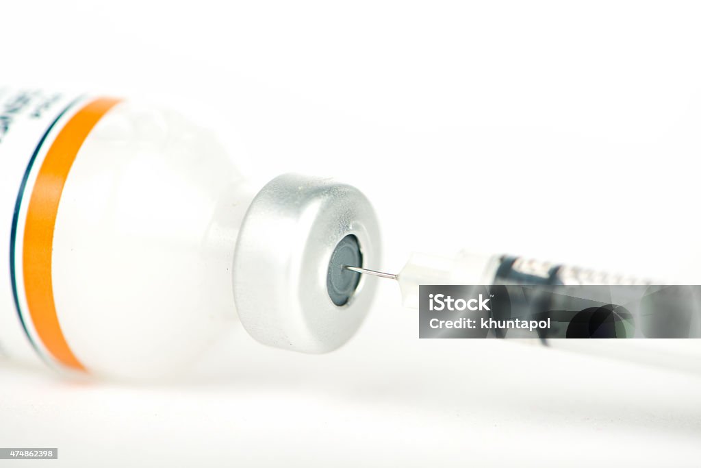 Closed up filling injection syringe from medical ampule 2015 Stock Photo