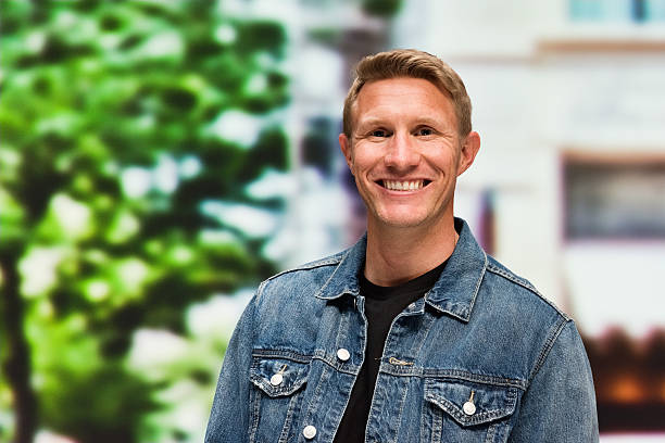 istock Cheerful casual man looking at camera 474867888