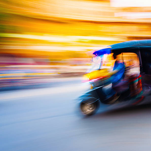 istock Tuk-tuk speeding India 474871782