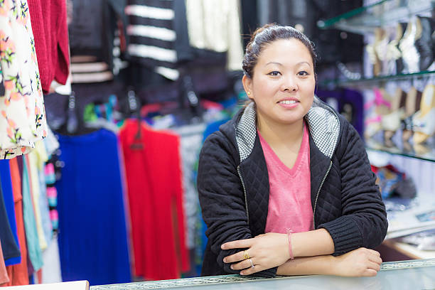 istock Sales woman at the counter 474871784