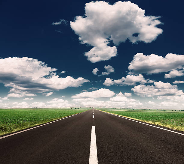 istock Driving on an empty highway at beautiful sunny day 474873959