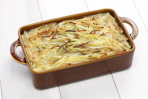 Janssons frestelse Janssons frestelse, Jansson’s temptation, Swedish potato gratin with sprat fillets seafood gratin stock pictures, royalty-free photos & images