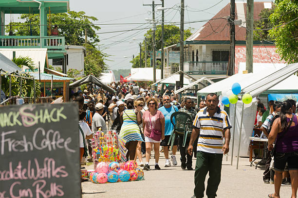 Punta Gorda, Belize - May 23, 2015: Festival goers at The Annual Chocolate Festival held in Punta Gorda, which is situated in the Toledo District of Belize. The festival is a showcase for chocolate producers in Belize to promote the many uses of chocolate in daily life. The range of uses demonstrated includes; personal care, culinary arts, and beverages.