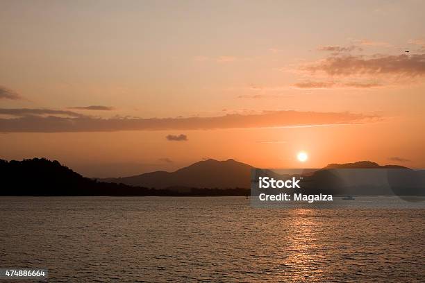 Sunset On The Panama Canal Stock Photo - Download Image Now - 2015, Central America, Dramatic Sky