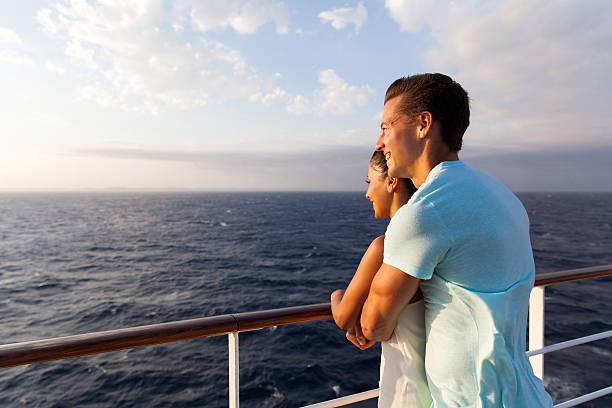 casal, desfrutando da vista para o mar de manhã - cruise passenger ship nautical vessel vacations - fotografias e filmes do acervo