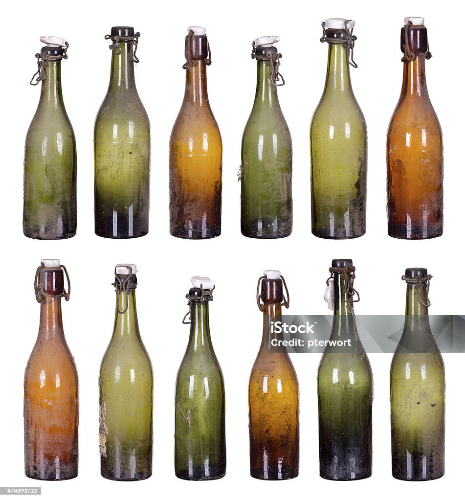 concept very old dusty bottles Alcohol - Drink Stock Photo