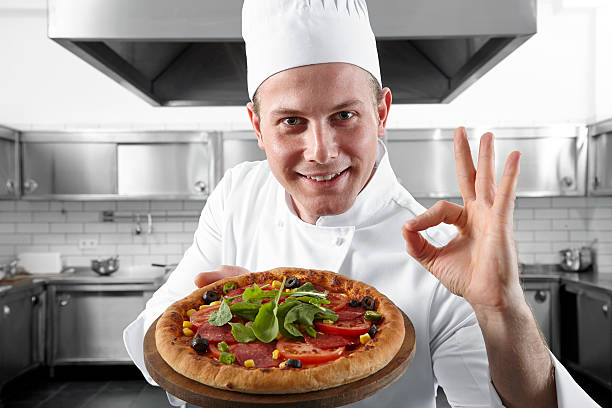 1,400+ Man Holding Pizza In Kitchen Stock Photos, Pictures & Royalty ...