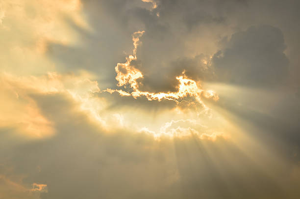 istock Ray of sunset light through the cloud 474893828