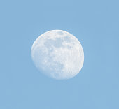 Moon over blue sky