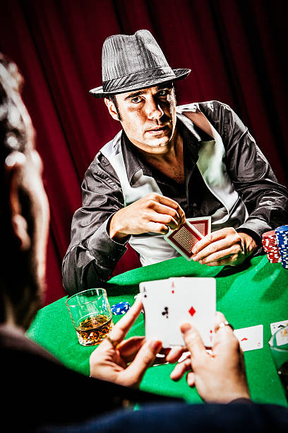 Poker players Poker players. Left player has 2 aces in hands.  child gambling chip gambling poker stock pictures, royalty-free photos & images