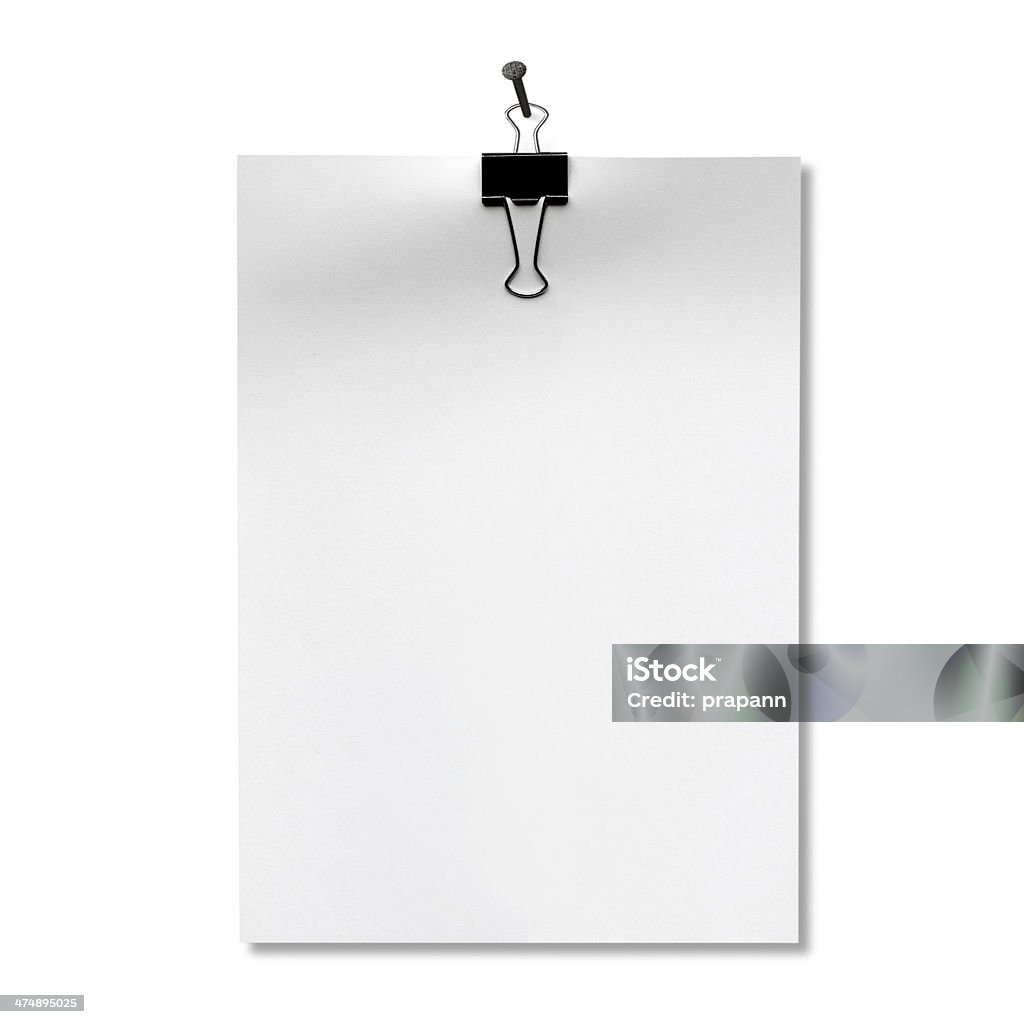 clipboard hanging on white wall Above Stock Photo
